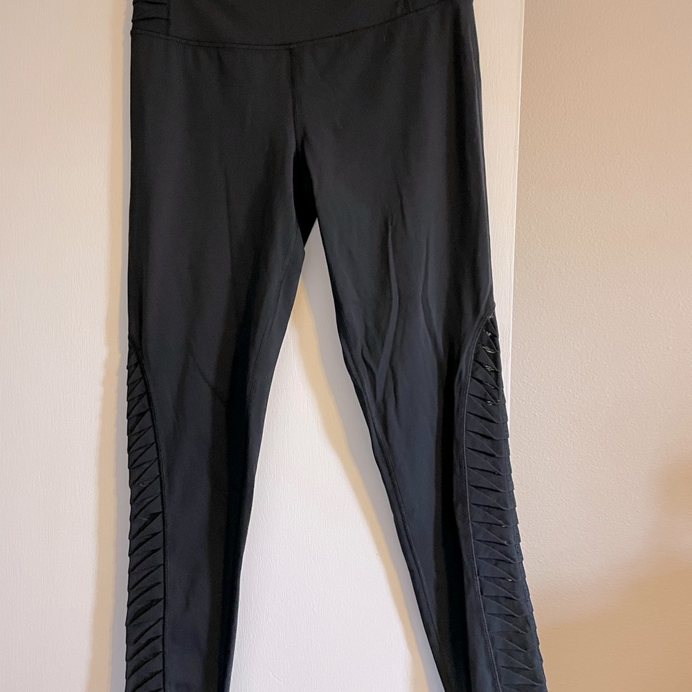 Victoria’s Secret Sport Leggings, pre owned, no pilling, mesh side leg.